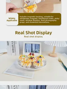 Detailed view of realistic PU cake model with faux fruit and built-in magnetic feature