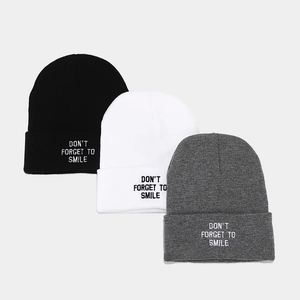 Winter knit beanie hats with 'DON'T FORGET TO SMILE' embroidery in black, white and grey