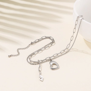 Double layer stainless steel necklace with paperclip chain and hollow heart pendant