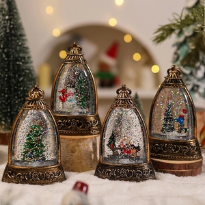 Retro Christmas water globe night light featuring Santa and snowman with golden finish