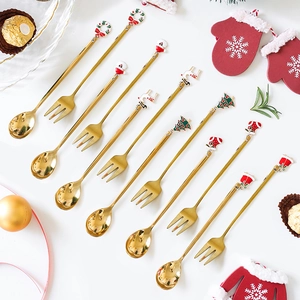 Detailed set of 12 golden Christmas dessert spoons and forks with enamel festive charms