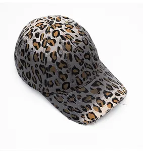 Detail of grey leopard print baseball cap with distressed brim and canvas texture