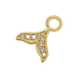 Detailed macro shot of a gold whale tail pendant featuring sparkling zircon micro-pave