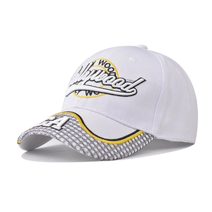 White baseball cap with Hollywood embroidery and checkered patterned brim details