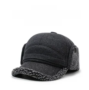 Detail of warm winter trapper hat with thick grey fleece lining and side ear flaps