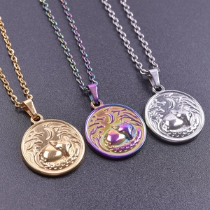 Detailed relief of fox and moon on gold, silver, and rainbow stainless steel pendants