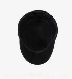 Detailed interior view of the black flat cap showing soft lining and sweatband detail