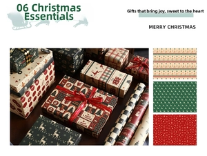 Close-up of vintage kraft Christmas wrapping paper set with reindeer and snowflake patterns