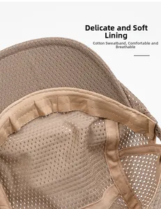 Detail of soft cotton sweatband and breathable mesh lining inside the khaki newsboy cap