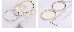 Detailed view of square link bracelets in gold silver rose gold with sizing ruler