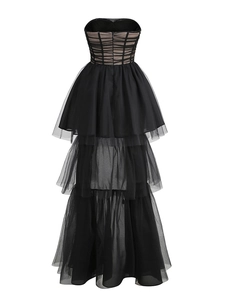 Detail of black layered tulle cake skirt with sheer mesh and corset-style boning structure