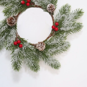Frosted PE pine needle Christmas wreath with red berries and natural pine cones