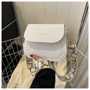 White faux crocodile saddle bag with golden hardware and wide patterned strap for women