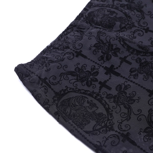 Close-up of black lace fabric featuring intricate floral embroidery and sheer mesh texture