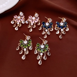 Detail of water drop tassel earrings with pink, blue and green zircon crystals