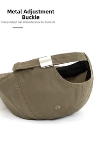 Detail of adjustable silver metal buckle on olive green herringbone textured baseball cap