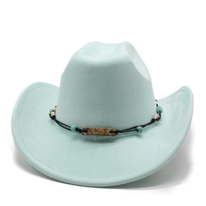 Detail of mint green suede cowboy hat with handmade beaded band and curved brim