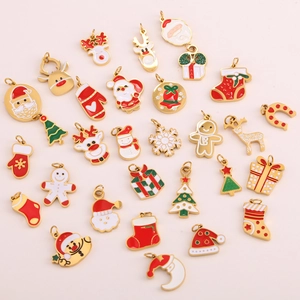 Mix of Christmas enamel charms featuring Santa, reindeer, and trees for DIY jewelry making