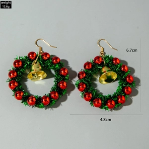 Detailed Christmas wreath earrings size 6.7x4.8cm and 12.6g weight on light gray base
