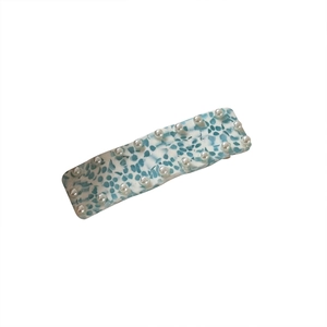 Blue and white terrazzo acetate hair clip with elegant double-row pearl detailing