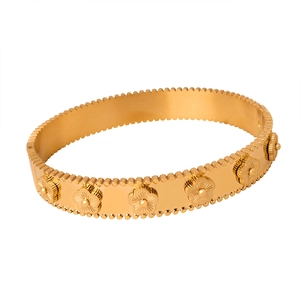 Elegant gold titanium steel bangle with floral reliefs and textured beaded edges