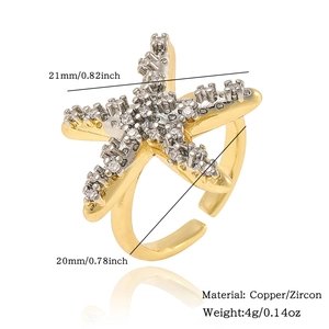 Detail view of gold starfish ring with zircon pavé showing 21mm size dimensions