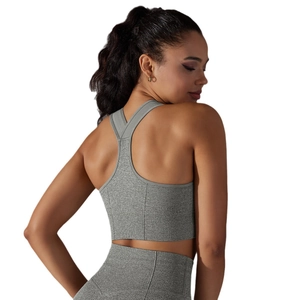 Women's seamless knit sports bra and shorts set in heather gray with racerback design
