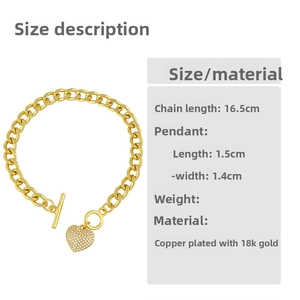 Close-up of gold 18K plated heart bracelet with OT buckle and size specifications