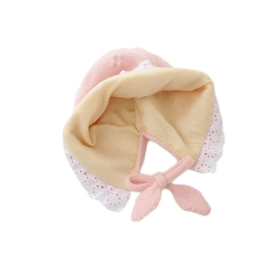 Pink knit baby bonnet with lace trim and warm lining for winter protection