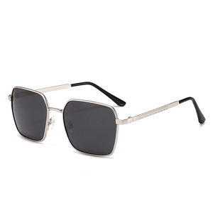 Polarized sunglasses with silver metal frame and dark gray lenses on white background