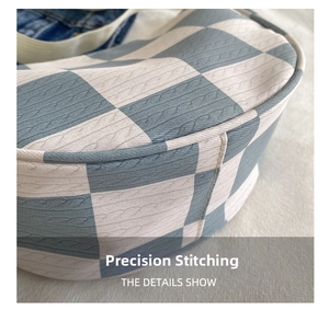 Detail showing precise stitching on blue and white checkerboard knit fanny pack