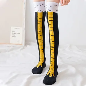Funny chicken feet over-knee socks in black and yellow with creative novelty patterns