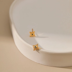 Vintage 18K gold-plated brass star stud earrings with navy blue center and bead details