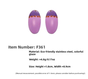 Detailed macro view showing purple enamel finish on polished stainless steel earrings