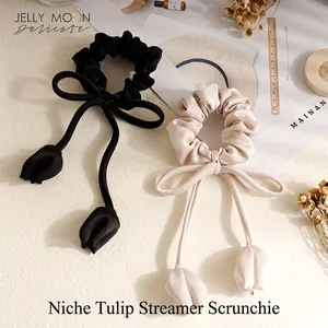 Elegant tulip ribbon scrunchie set in black and cream satin with floral pendants