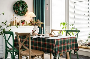 Close-up of green and red plaid tablecloth with cotton-linen texture for Christmas