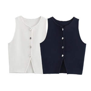 Detailed close-up of slim-fit knit vest featuring unique silver irregular buttons