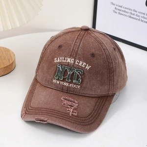 Distressed vintage brown cotton baseball cap with NYC sailing crew embroidery