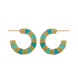 Detail of C-shaped gold-plated earrings with teal and light green enamel geometric pattern