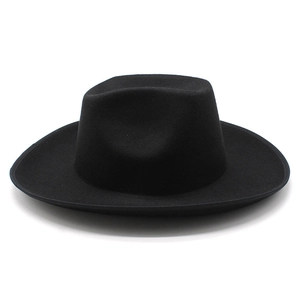 Close-up of the 8cm rolled brim and texture on the black felt western cowboy jazz hat