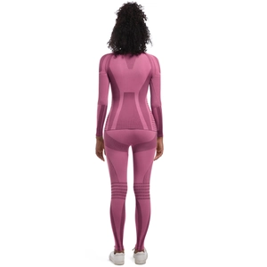 Back view of seamless knitted sports suit in rose purple with functional texture details