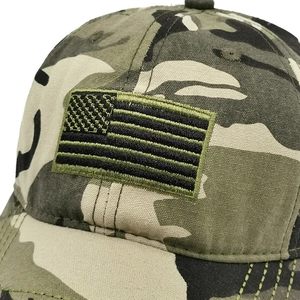 Close-up of tactical camo baseball cap with high-quality US flag embroidery and canvas texture