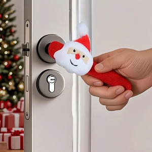 Detail of a red knit Christmas door handle cover with a plush Santa Claus character