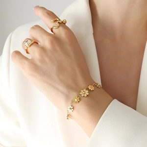 Set bracciale a margherita e anello con zircone placcato oro 18K per donna