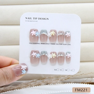 Handmade cat eye press-on nails with 3D floral accents and pearls in pastel colors