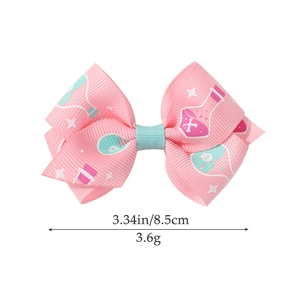 Pink Halloween bow hair clip with potion bottle prints, 3.34 inches width and 3.6g weight