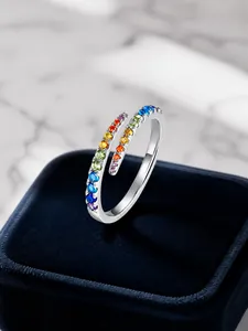Detailed macro view of S925 sterling silver ring featuring colorful gradient zircon stones