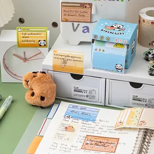 Cartoon panda and capybara sticky note set with storage box and drawer on a desk