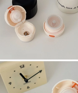 Detail of insulated water bottle with pop-up lid and fine mesh stainless steel tea filter