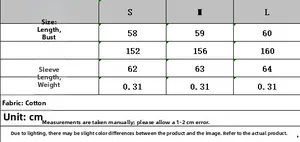 Size chart detail for oversized batwing sleeve knit sweater with measurements in cm